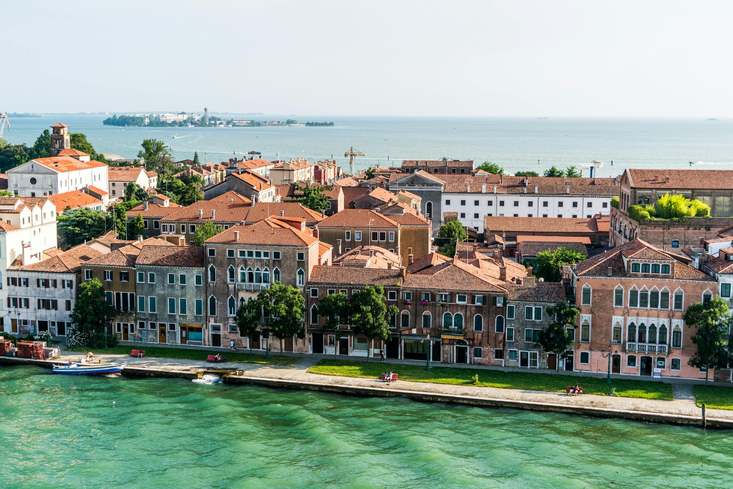 A picturesque view of Venice's historic architecture by the canal, perfect for travel and tourism promotions.